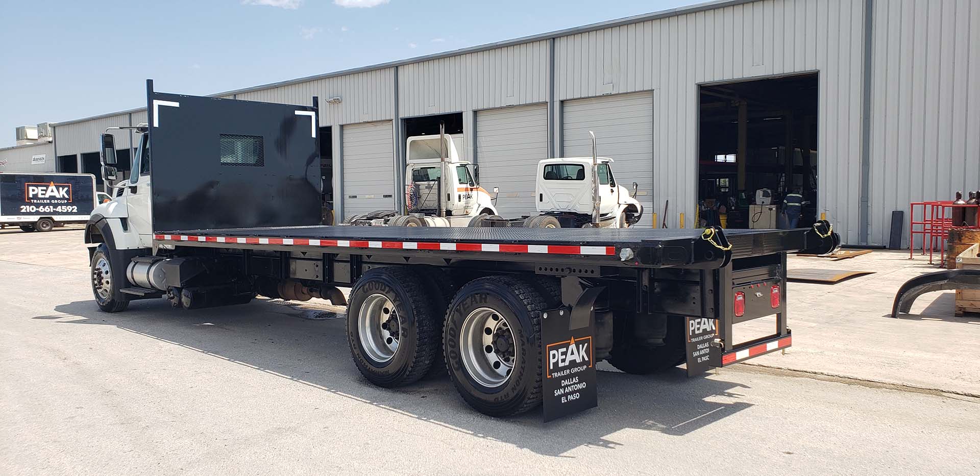 Flatbed w/Forklift #1